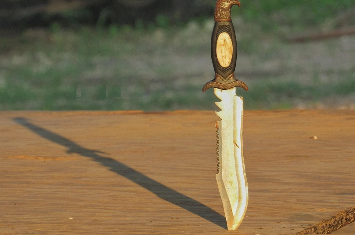 Stabilised hardwood handle scales on a bench